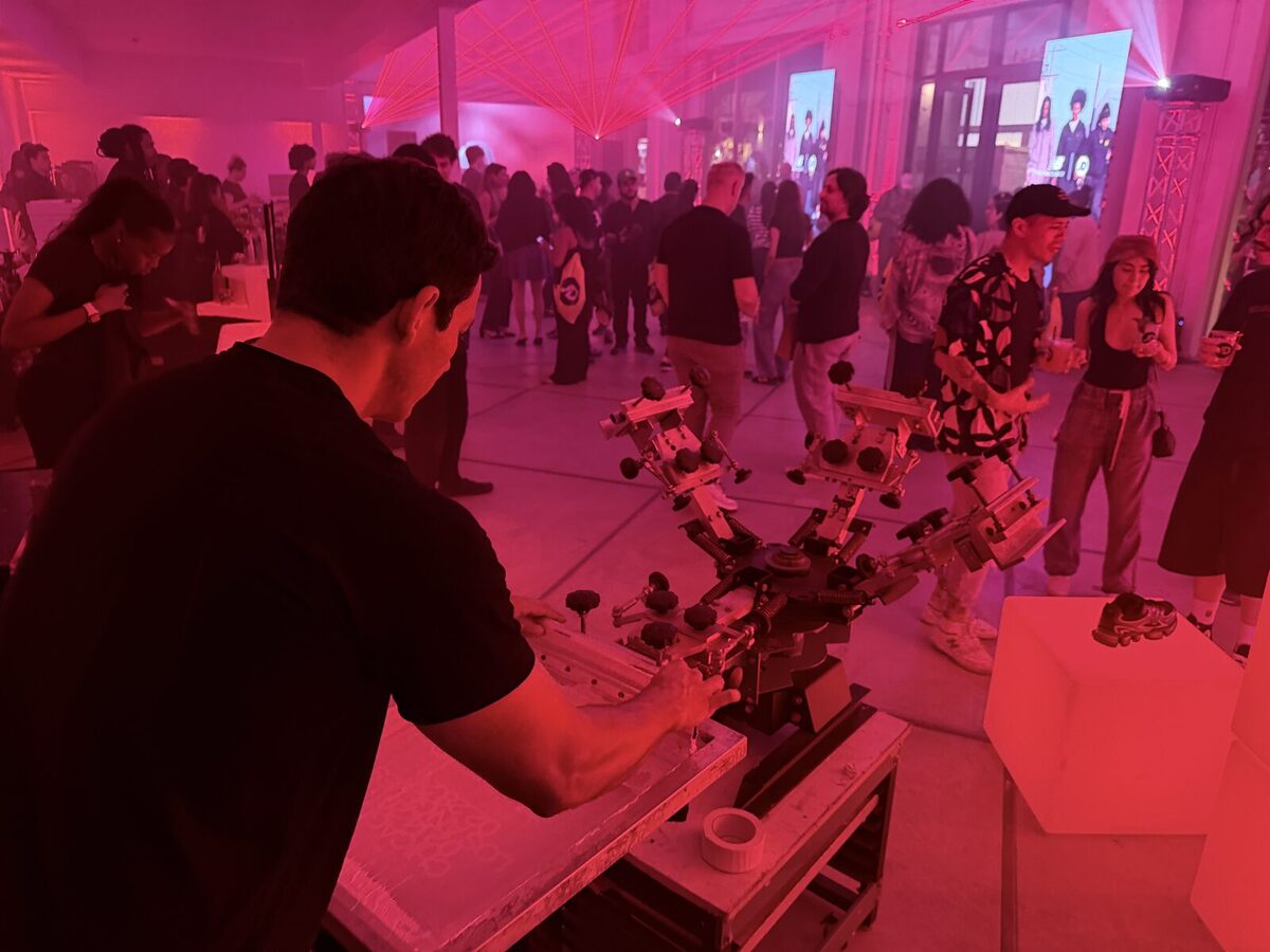 Merch Troop activation running under lights at an evening event